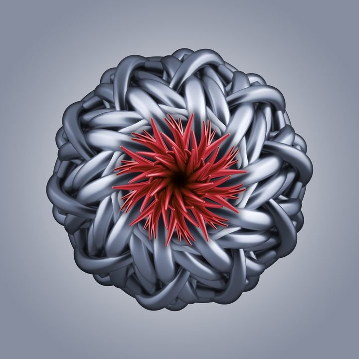 A red spiky core sits inside a gray woven ball, symbolizing a hidden danger or problem within a complex system.