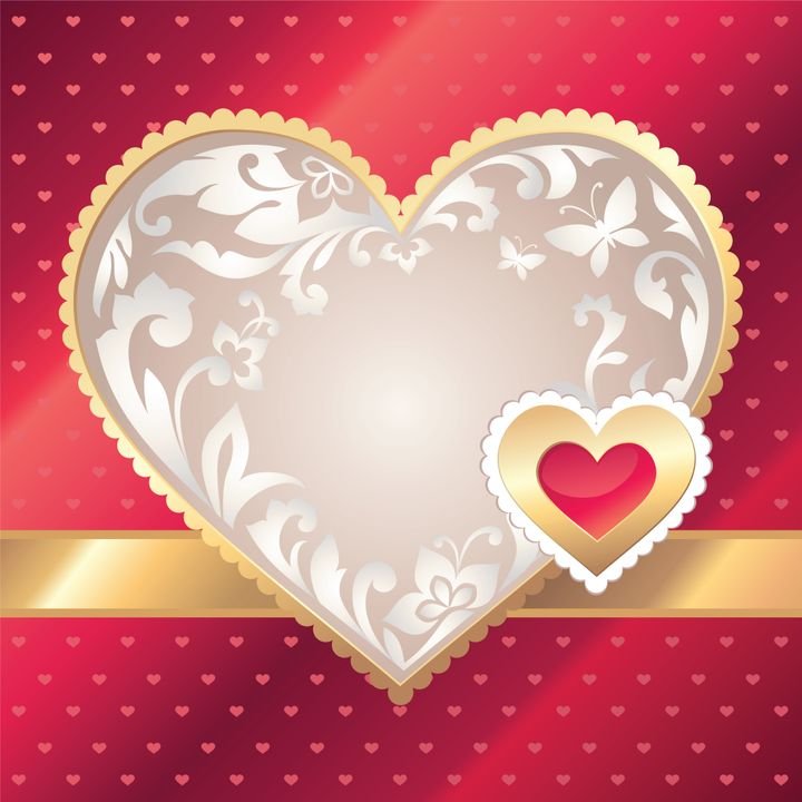 A large ornate heart with floral patterns sits on a red background dotted with small hearts. A gold ribbon runs horizontally across the image, and a smaller heart with a red center rests on the ribbon.