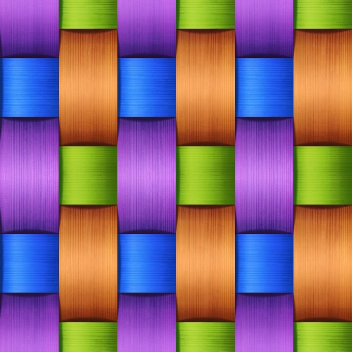 A colorful woven pattern features interlaced ribbons in blue, green, purple, and orange, creating a vibrant, textured design.