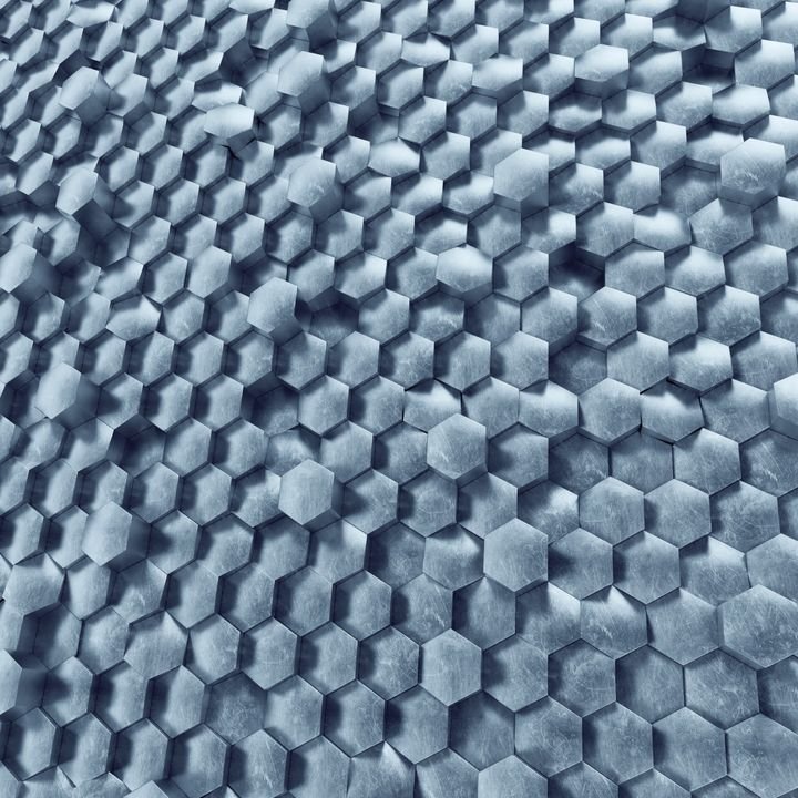A textured surface of raised hexagons creates a geometric pattern with a metallic blue-gray finish and subtle shadows.