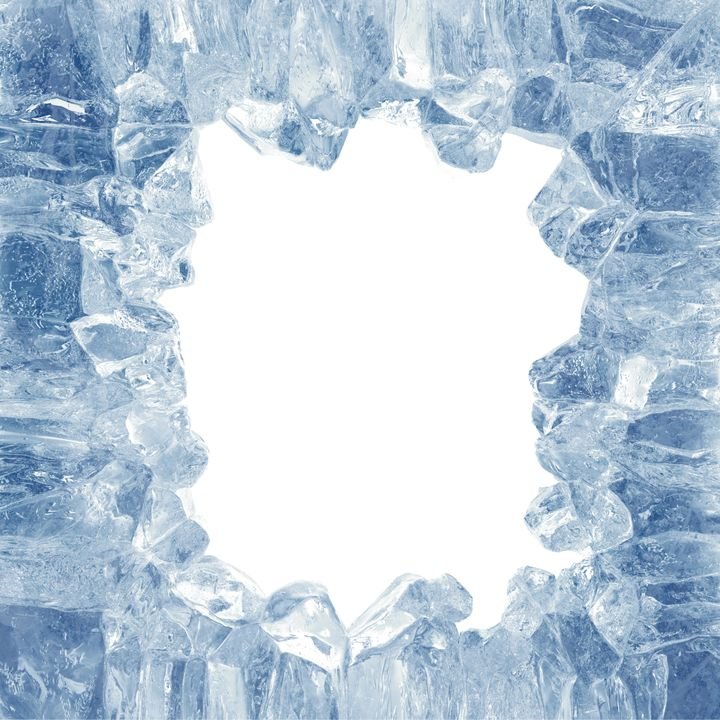 A jagged frame of clear ice crystals surrounds a bright white center, showcasing sharp textures and cool blue tones.