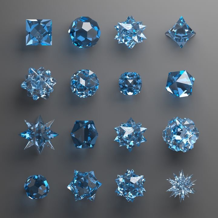 A collection of blue gemstones in various shapes and sizes arranged on a gray background.