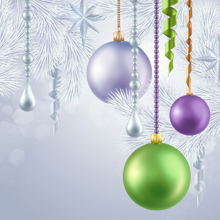 Festive ornaments hang from pine branches against a soft, icy background.