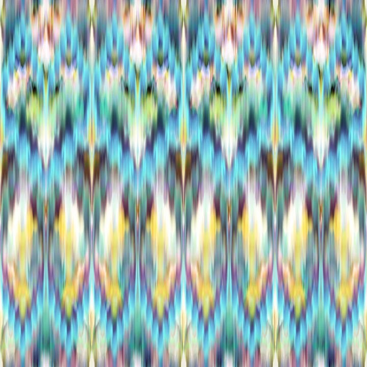 A vibrant, abstract pattern features repeating symmetrical shapes in shades of blue, yellow, green, and purple, creating a dynamic, kaleidoscopic visual effect.