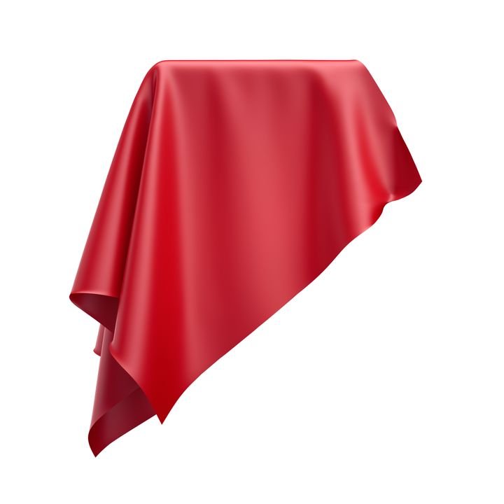 A red tablecloth drapes elegantly over a table, creating soft folds and a smooth, satin-like texture.