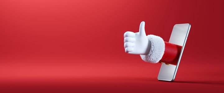 3d render. Cartoon character Santa Claus hand shows thumb up, sticking out the mobile phone screen. Christmas banner with red background. Like gesture, approval concept