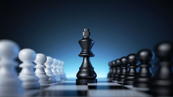 3d rendering, chess game pieces over the blue background, black king is placed in the middle of the chessboard between two rows of black and white pawns. Politics concept, leadership metaphor