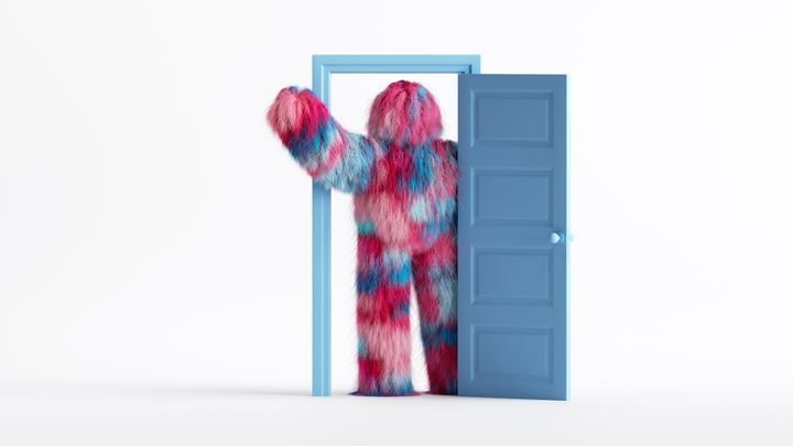 3d render, funny hairy monster with hand up, stands inside the doorway, in the empty room. Modern minimal cartoon character concept