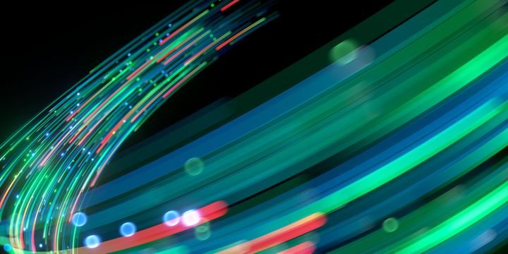 3d render, abstract blue red green neon background with unfocussed glowing lines and bokeh lights. Blurry wallpaper