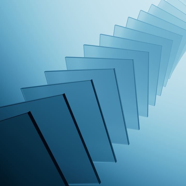 3d rendering. Abstract monochrome geometric background. Flat square glass panels, spaced evenly, arranged in a row with slight rotation and displacement, in shades of blue