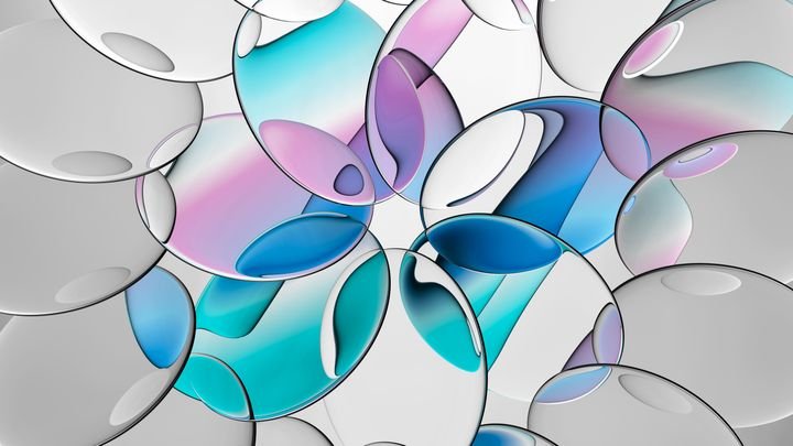 A composition of colored crystal lenses refracting colored iridescent gradients. 3d illustration of oval glass pieces. A kaleidoscope of colored water droplets