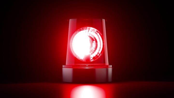 3d render, looping animation of a rotating red flashing light. Emergency alarm flasher isolated on black background