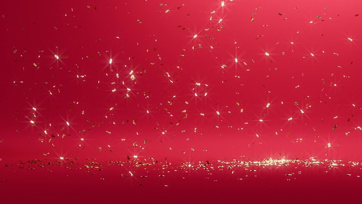 3d Christmas celebratory party popper animation, golden confetti fall down on red background, gold glitter particles