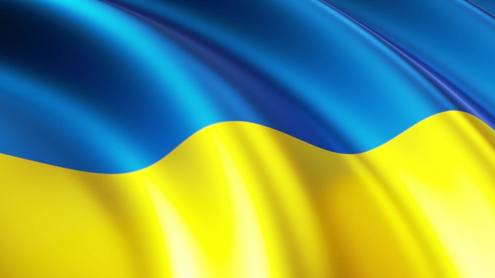 cycled 3d animation, waving blue-yellow Ukrainian flag, abstract patriotic background