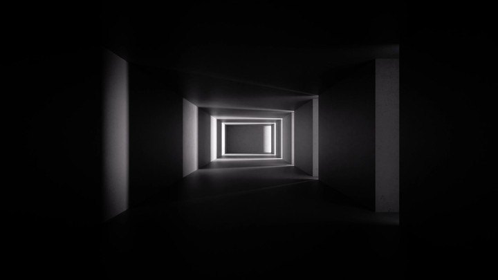 cycled 3d animation. Abstract background. Light appears and fades away. Shadows move through the empty corridor with concrete walls