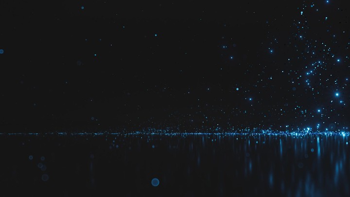 Blue sparks in the dark, sparkling like glitter, whirl and leave fading lights and reflections on the floor, creating a magical, festive feeling. 3D animation with a sense of wonder