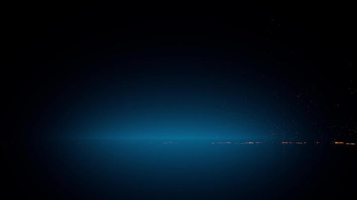 3D animation of bright golden sparks swirling left to right in the dark, scattering and leaving blurry reflections on the floor. Fading lights create a magical, festive atmosphere. Abstract background