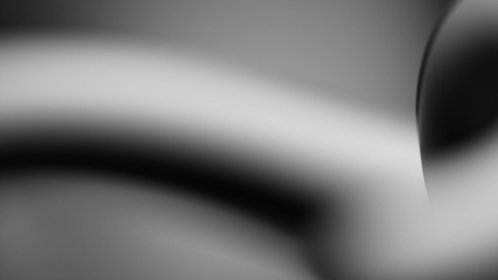 Cycled 3d animation. Abstract unfocussed grainy background of moving shadows and lights. Monochrome motion design