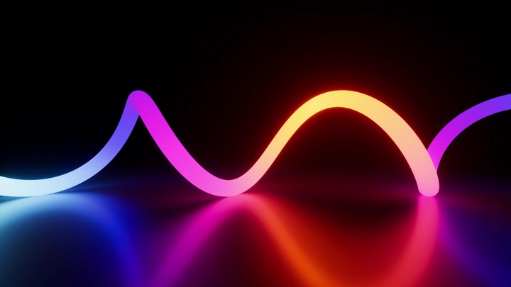 3d animation of a multicolored neon line with loops, glowing in the dark and reflected in a mirrored floor. Abstract motion design of a wavy ribbon